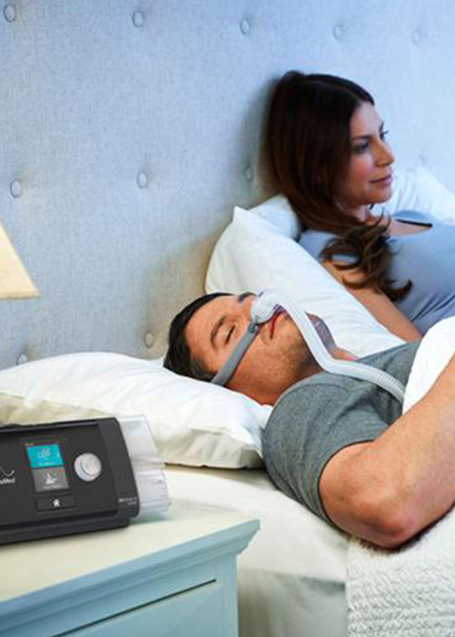 Man sleeping with a CPAP